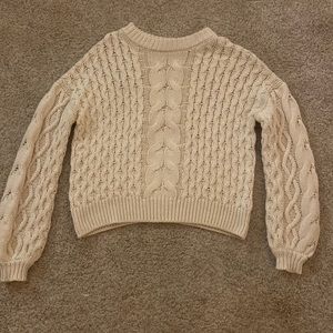 Fall sweater beige color.